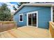 The backyard wooden deck is attached to the home and has wooden railing at 7469 Lion Dr, Nineveh, IN 46164