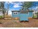 The backyard shed sits next to the home at 7469 Lion Dr, Nineveh, IN 46164