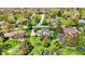Aerial view of a home in a residential neighborhood, showcasing the surrounding greenery and nearby houses at 7531 Normandy Blvd, Indianapolis, IN 46278