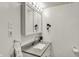 Well lit bathroom featuring a gray granite countertop, neutral colors and updated features at 7531 Normandy Blvd, Indianapolis, IN 46278