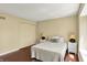 Simple bedroom featuring hardwood floors, a double bed, and standard closet at 7531 Normandy Blvd, Indianapolis, IN 46278