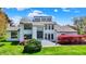 Elegant home with a well-manicured lawn, beautiful landscaping, and striking architectural design, creating a welcoming curb appeal at 7531 Normandy Blvd, Indianapolis, IN 46278