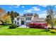 Stunning modern home with grand entrance, meticulously landscaped front yard, and striking architectural details at 7531 Normandy Blvd, Indianapolis, IN 46278