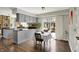 Bright kitchen with ample counter space, eat-in table and access to the backyard patio at 7531 Normandy Blvd, Indianapolis, IN 46278