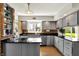Charming kitchen with stainless steel appliances, granite countertops, and wood floors at 7531 Normandy Blvd, Indianapolis, IN 46278