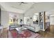 Bright living room with vaulted ceilings, large windows, hardwood floors and open floorplan at 7531 Normandy Blvd, Indianapolis, IN 46278