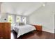Light-filled main bedroom with hardwood floors and an A-frame ceiling at 7531 Normandy Blvd, Indianapolis, IN 46278