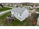 Aerial view of a home with a spacious backyard in a peaceful, suburban neighborhood at 805 Harvest Lake Dr, Brownsburg, IN 46112