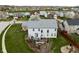 An aerial view of a home with a spacious yard and deck in a picturesque neighborhood at 805 Harvest Lake Dr, Brownsburg, IN 46112