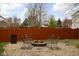 Backyard fire pit with chairs, great for enjoying the outdoors and entertaining with friends and Gathering at 805 Harvest Lake Dr, Brownsburg, IN 46112