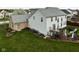 Spacious backyard featuring a well-maintained lawn and an entertainment pergola off of the rear deck at 805 Harvest Lake Dr, Brownsburg, IN 46112