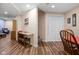 Spacious basement with laminate flooring, a dining table, and ample space for entertaining at 805 Harvest Lake Dr, Brownsburg, IN 46112