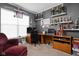 Home office featuring a large desk and shelves filled with trophies and awards at 805 Harvest Lake Dr, Brownsburg, IN 46112