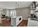 Modern kitchen with an island, stainless steel appliances, and an open layout at 827 E Minnesota St, Indianapolis, IN 46203