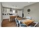 Open kitchen and dining area with modern cabinetry and stainless steel appliances at 827 E Minnesota St, Indianapolis, IN 46203