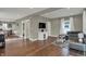 Open-concept living room with hardwood floors and neutral wall paint at 827 E Minnesota St, Indianapolis, IN 46203