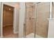 Bathroom featuring a glass enclosed shower with tile surround at 8404 Alcona Dr, Indianapolis, IN 46237