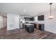 Modern kitchen boasts stainless steel appliances and dark cabinets at 846 Sunchaser Rd, Lebanon, IN 46052