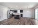 Modern kitchen features stainless steel appliances, granite countertops and dark cabinets at 846 Sunchaser Rd, Lebanon, IN 46052