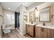 Bathroom with double vanity, walk-in shower, and modern fixtures at 9111 Sand Key Ln, Indianapolis, IN 46256