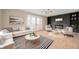 Cozy living room featuring stylish furniture, fireplace and hardwood floors at 9111 Sand Key Ln, Indianapolis, IN 46256