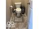 Small bathroom featuring a standard toilet, neutral walls, and flooring at 9851 Pica Dr, Fishers, IN 46040