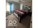 Bedroom with an ornate dark wood bed frame, plush bedding, and decorative window treatments at 9851 Pica Dr, Fishers, IN 46040