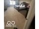 Spacious bedroom featuring plush carpeting, large windows, and dark wood furnishings at 9851 Pica Dr, Fishers, IN 46040