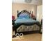 Stylish bedroom featuring a king-size bed with mirrored accents and plush headboard at 9851 Pica Dr, Fishers, IN 46040
