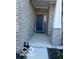 Inviting front entrance with a welcoming 'WELCOME' sign and a charming decor at 9851 Pica Dr, Fishers, IN 46040