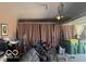 A messy garage interior filled with bikes, containers, and other items at 9851 Pica Dr, Fishers, IN 46040