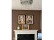 Features a charming fireplace and wall decor at 9851 Pica Dr, Fishers, IN 46040