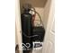 Water filtration and water softening system inside of the utility closet at 9851 Pica Dr, Fishers, IN 46040