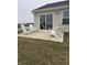 Back patio featuring outdoor furniture and access to backyard at 99 Gnarled Oak Ln, Whiteland, IN 46184