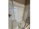 Walk-in shower with built in seat, tiled surround and glass door at 99 Gnarled Oak Ln, Whiteland, IN 46184
