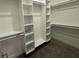Organized walk-in closet with multiple shelves and clothing rods at 1038 St Peter St, Indianapolis, IN 46203