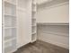 Walk-in closet with custom shelving and ample storage space for an organized wardrobe at 1038 St Peter St, Indianapolis, IN 46203