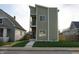 Modern two-story home featuring a charming front yard and beautiful exterior paint at 1038 St Peter St, Indianapolis, IN 46203