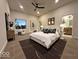 Spacious main bedroom features a ceiling fan and plenty of natural light at 1038 St Peter St, Indianapolis, IN 46203