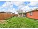 View of the yard and a covered patio at 1061 N Layman Ave, Indianapolis, IN 46219