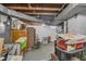 Unfinished basement with storage and utilities at 1061 N Layman Ave, Indianapolis, IN 46219