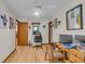 Bright bedroom with a workstation and a closet, featuring laminate floors at 1061 N Layman Ave, Indianapolis, IN 46219