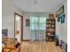 Bedroom with desk and bookshelf, natural light and wood flooring at 1061 N Layman Ave, Indianapolis, IN 46219