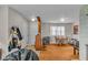 Bright dining area with hardwood floors, a round table, and ample space for entertaining guests at 1061 N Layman Ave, Indianapolis, IN 46219