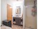 Bathroom featuring a vanity, mirror and shower at 10614 W Hickory Ct, Quincy, IN 47456