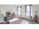 Bedroom with office desk, carpet and windows at 10614 W Hickory Ct, Quincy, IN 47456