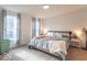 Bright bedroom with windows, carpet and lamps at 10614 W Hickory Ct, Quincy, IN 47456