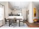 Bright dining area with modern decor and plenty of natural light, creating a welcoming atmosphere at 10799 Belair Dr, Carmel, IN 46280