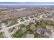 Beautiful aerial view of a suburban neighborhood with well-maintained lawns and mature trees at 10889 Weston Dr, Carmel, IN 46032