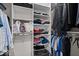 Walk-in closet featuring built-in shelving and organized storage at 10889 Weston Dr, Carmel, IN 46032